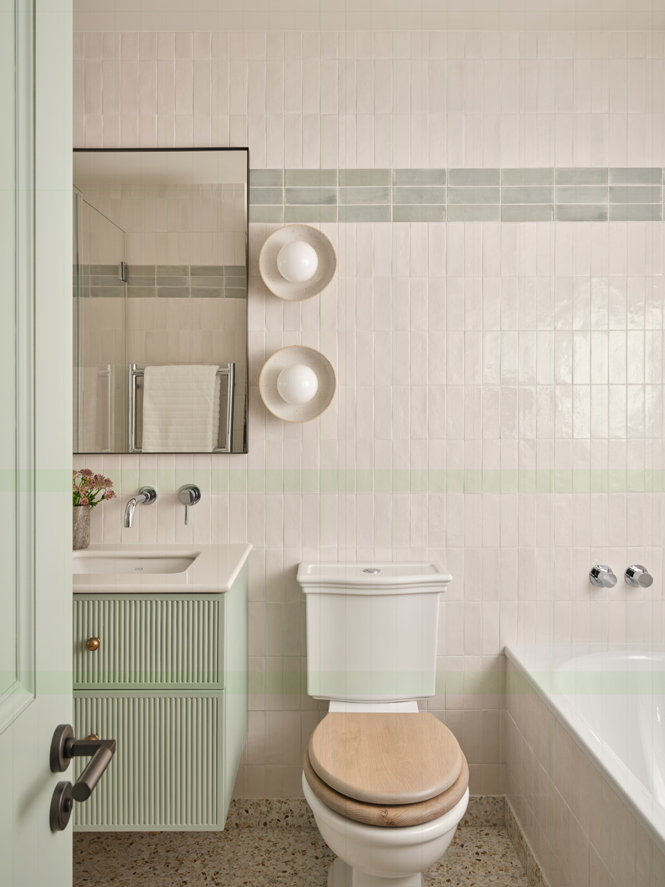 Family bathroom with zellige tiles and fitted sanitaryware