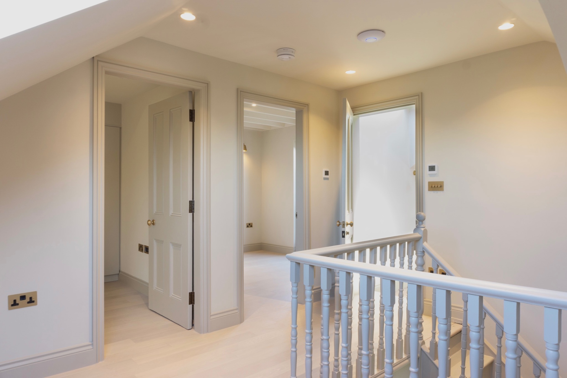 First-floor landing with retained joinery and new finishes